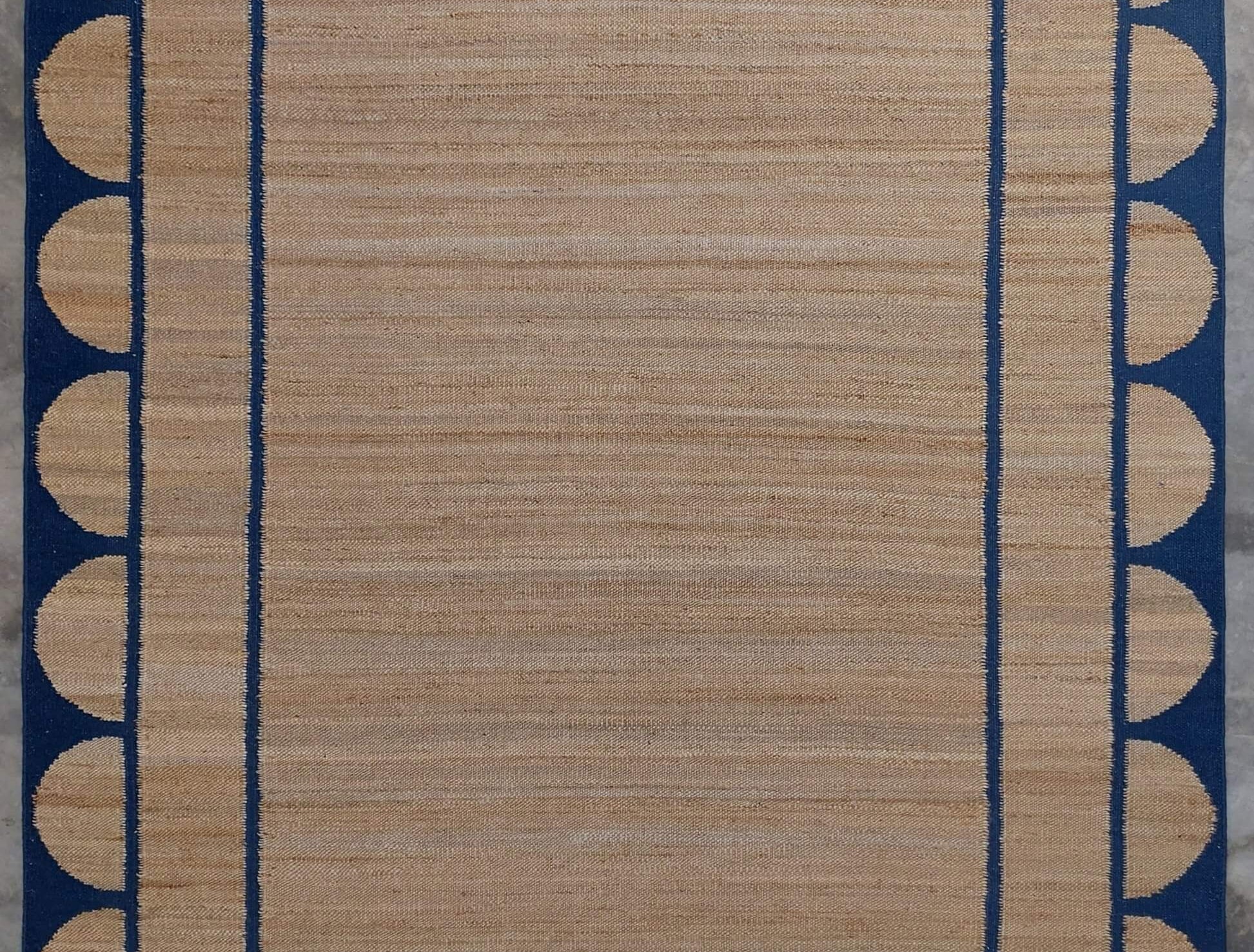 Scalloped edge jute rug in blue From Jaipur with Love