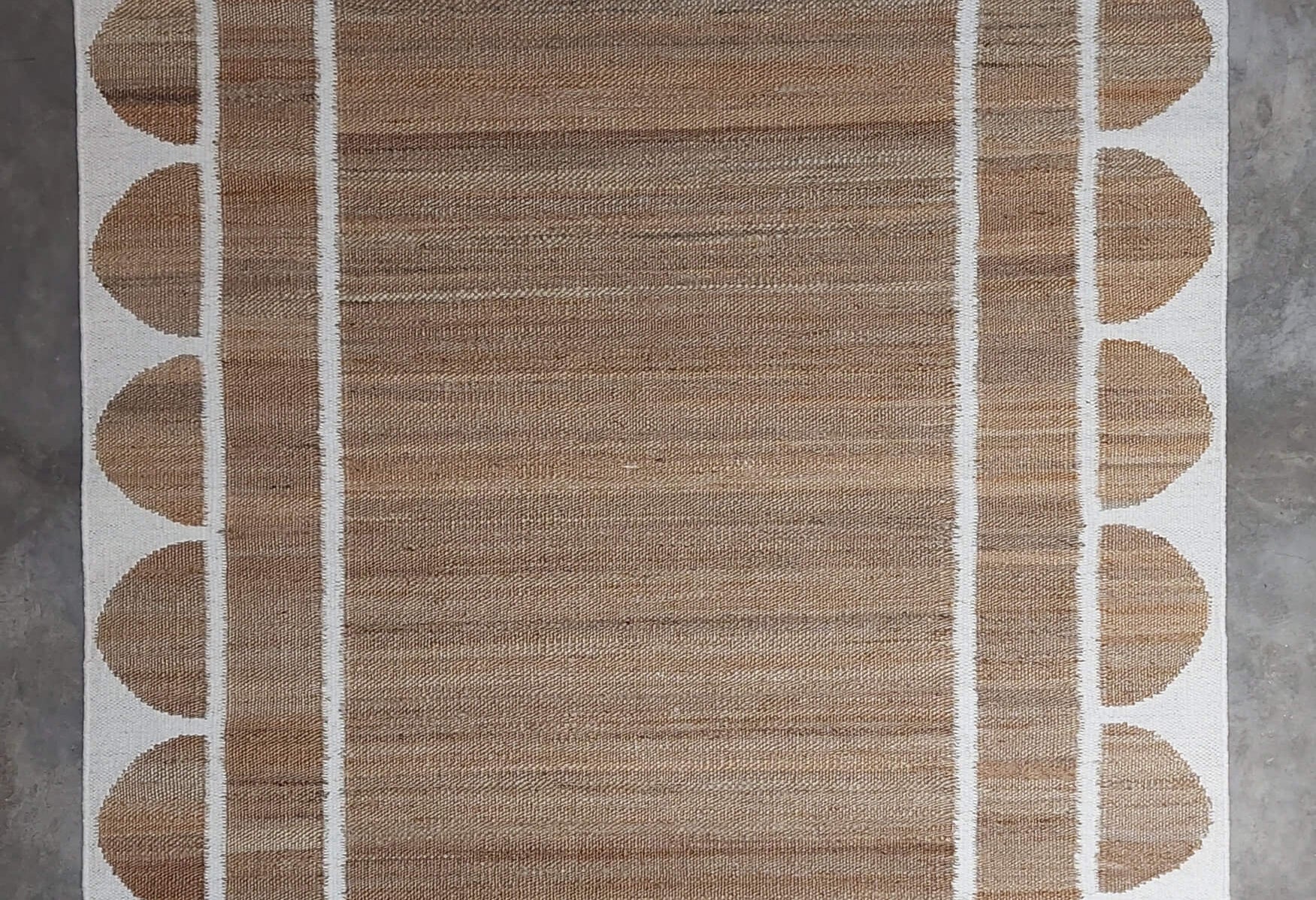 Scalloped edge jute rug in white From Jaipur with Love